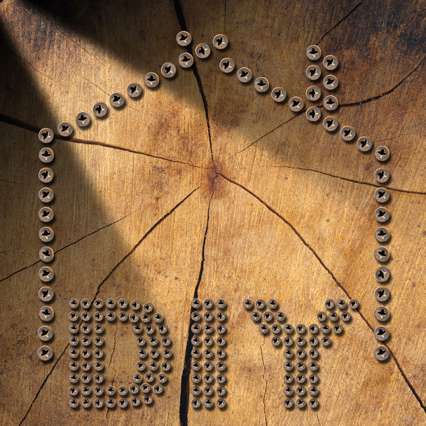 Diy Symbol - Screws on Wooden Background - Photo, Image