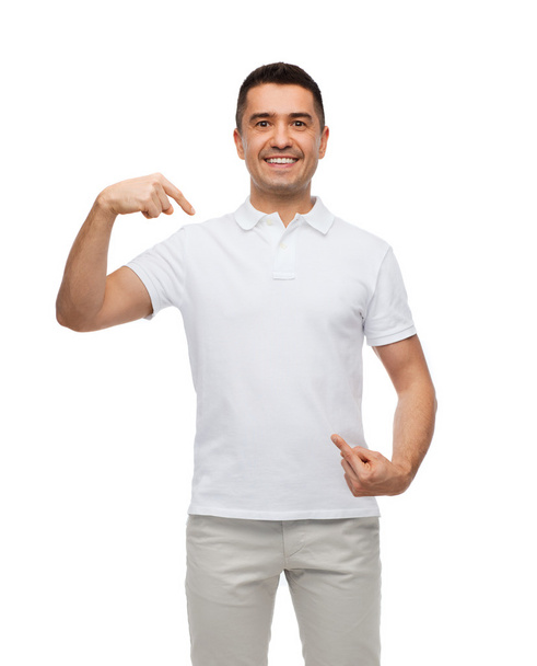 smiling man in t-shirt pointing fingers on himself - Zdjęcie, obraz