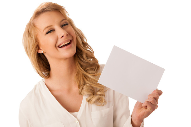 Beautiful young caucasian business woman holding a blank white b - Valokuva, kuva