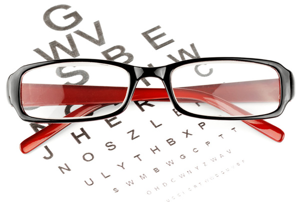 視力検査表と老眼鏡 - 写真・画像