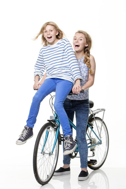 Sister on a bike - Foto, afbeelding