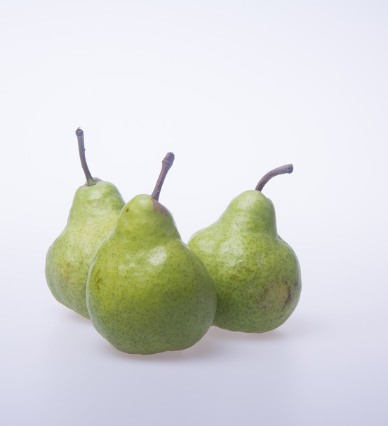 pears or three pears on a background. - Foto, immagini
