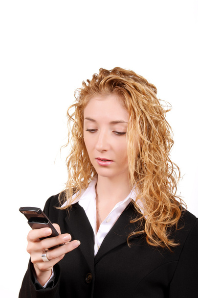 Текстовые сообщения бизнес-леди на мобильном телефоне
 - Фото, изображение