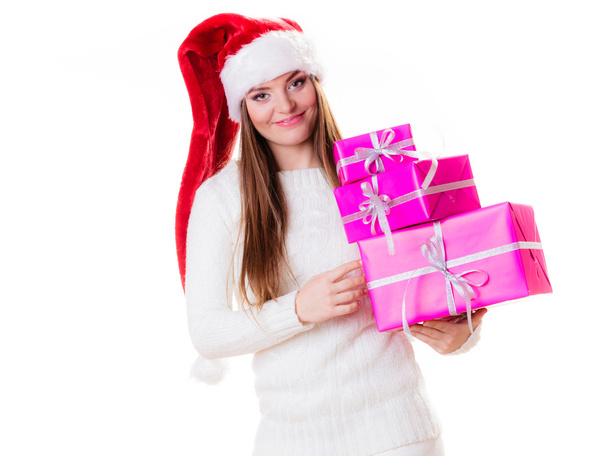 Woman holding stack of pink presents - Foto, afbeelding