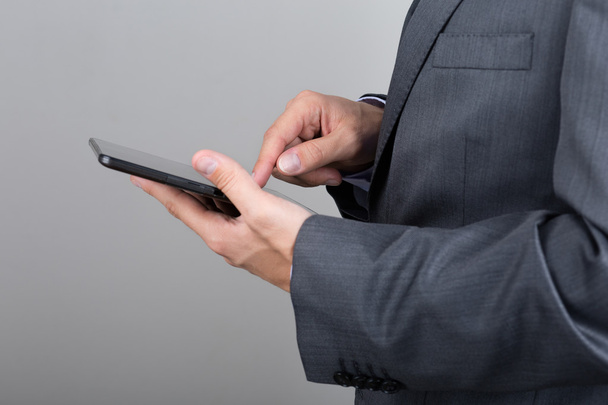 Close up of business man hands holding tablet pc - Photo, Image