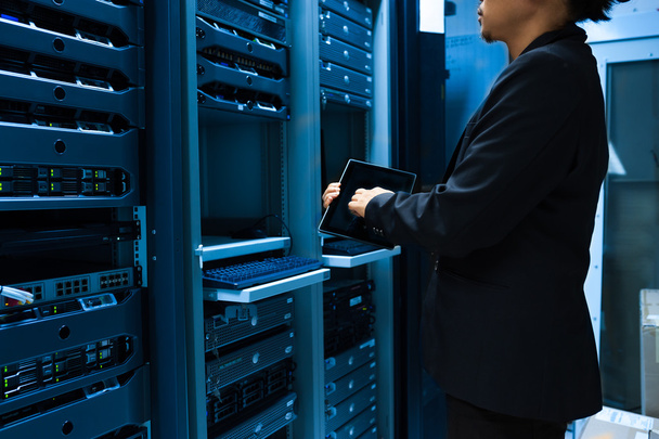 People fix server network in data room - Fotó, kép