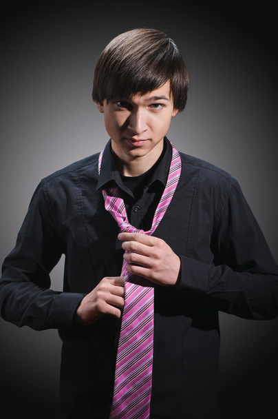 man adjusting tie - Zdjęcie, obraz
