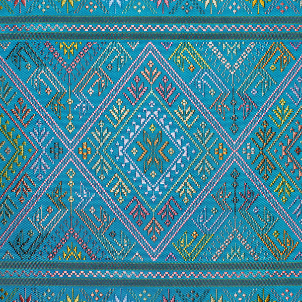 Colorful thai silk handcraft peruvian style rug surface close up More this motif & more textiles peruvian stripe beautiful background tapestry persian nomad detail pattern farabic fashionable textile. - 写真・画像