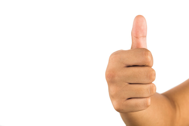 Hand with thumb up against white background. - Fotografie, Obrázek