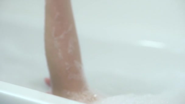 Young woman relaxing in bath - Felvétel, videó