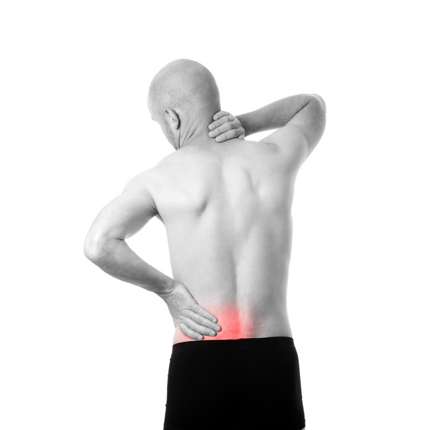 Полуобнаженный мужчина чувствует боль в спине
 - Фото, изображение