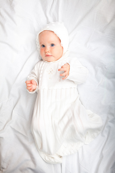Child in baptismal clothes - Foto, afbeelding
