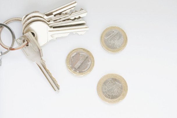 Keys and coins - Фото, изображение