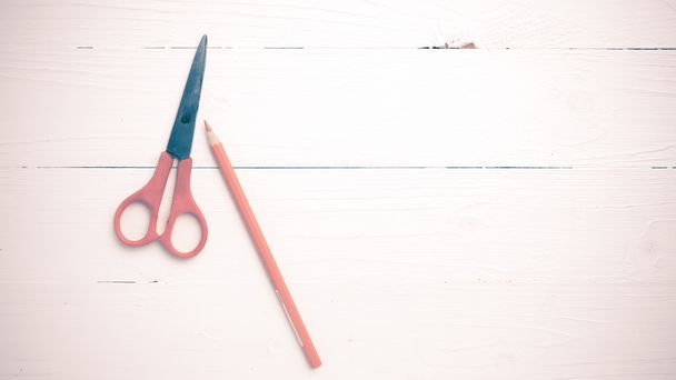 orange scissors and pencil vintage style - Foto, Imagen