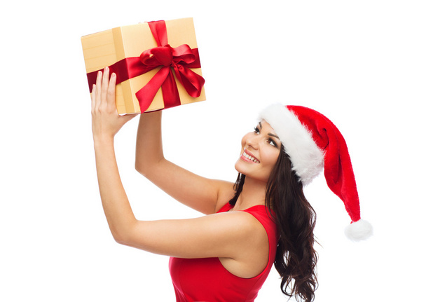 beautiful sexy woman in santa hat with gift box - Foto, Imagem