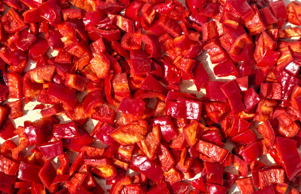 Ξήρανση ψιλοκομμένο πιπέρι κόκκινο φόντο - Φωτογραφία, εικόνα