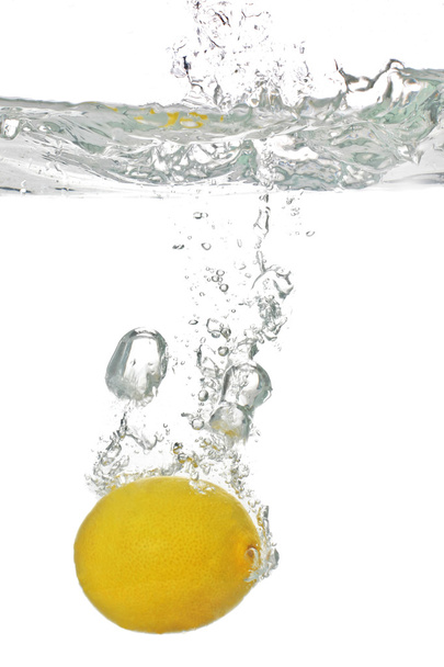 lemon falls into the water - Photo, image