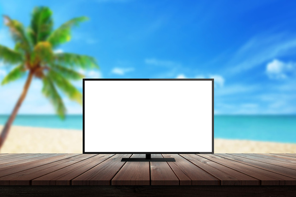 isolado tv na mesa com praia palma mar verão fundo para mock up apresentação
 - Foto, Imagem