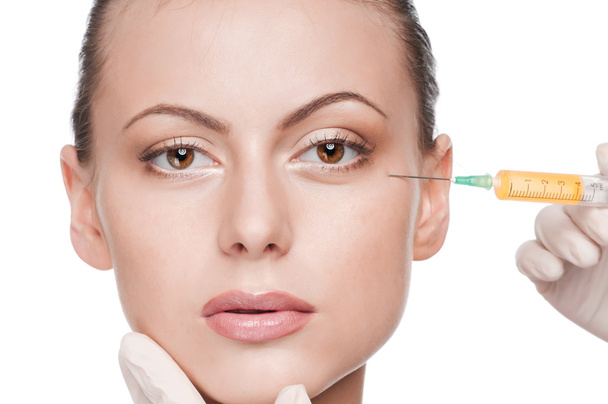 Injection cosmétique de botox dans le visage de beauté
 - Photo, image