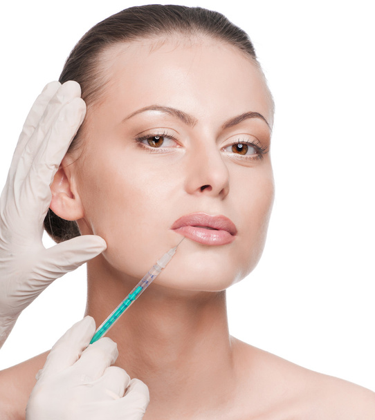 Cosmetic botox injection in the beauty face - 写真・画像