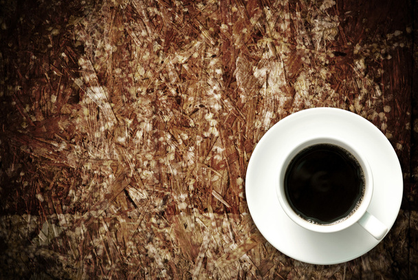 Taza de café en mesa de madera grunge
 - Foto, imagen