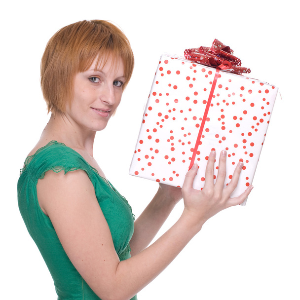 Close up portrait of woman with huge gift - 写真・画像