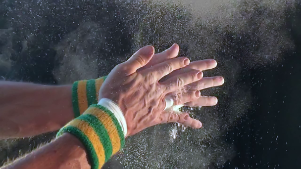 Hands of Gymnast Clapping Chalk Slow Motion - Footage, Video