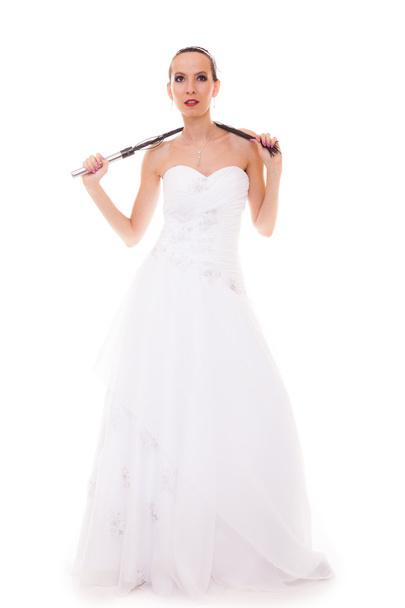bride white gown holds black leather flogging whip - Foto, Imagem
