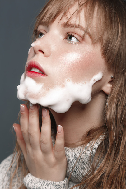 Young girl in sweater with foam beard - Zdjęcie, obraz