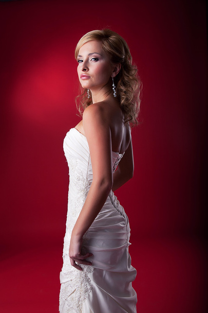 Bride - beautiful blond girl fashion model in wedding white dress standing - Foto, Imagem