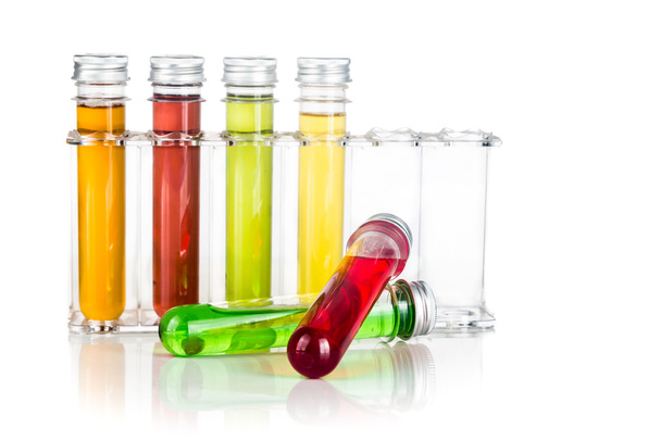 Test tubes with multi color chemicals isolated in white - Photo, Image