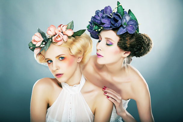 Lovely fairies - blonde and brunette in colorful wreaths posing - Foto, Imagem