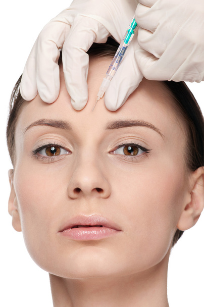 Cosmetic botox injection in the beauty face - Foto, afbeelding