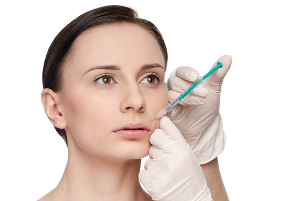 Cosmetic botox injection in the beauty face - Photo, image