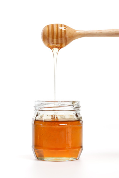 naběračka lahodné bílé pozadí closeup sladký med zdravý - Fotografie, Obrázek