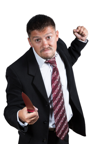 Angry businessman threaten with a knife - Fotó, kép