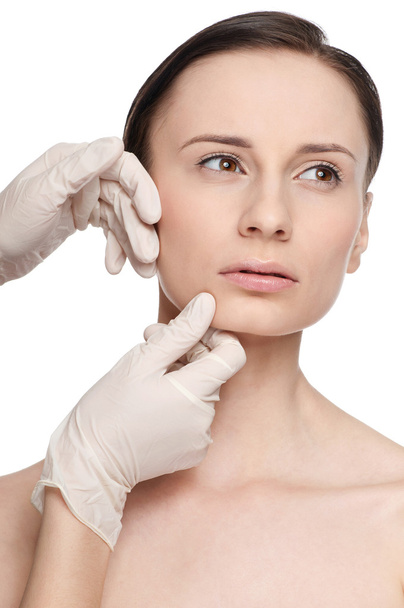 Beautician touch and exam health woman face. - Foto, Imagem