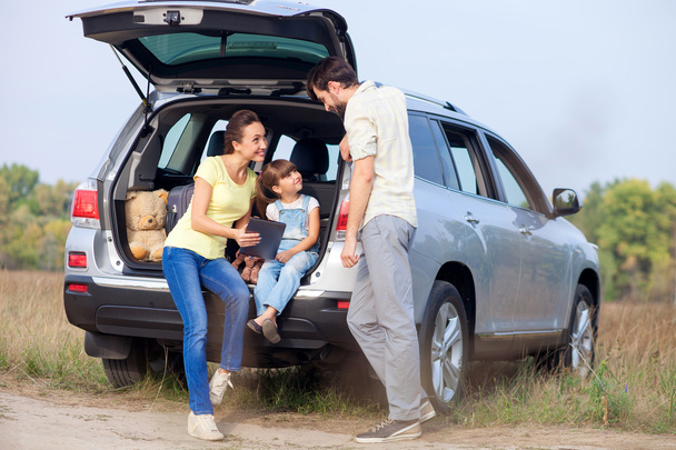 Cheerful family is making trip by vehicle - Fotó, kép