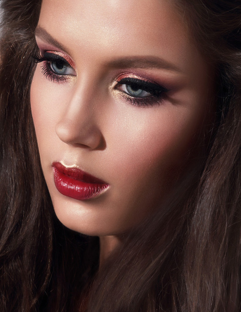 Portrait of beautiful girl with makeup . Bright lips. - Foto, imagen