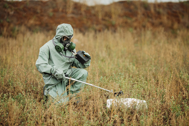 Scientist (radiation supervisor) in protective clothing and gas - Fotó, kép