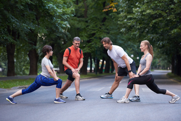 jogging people group stretching - Foto, Bild