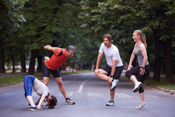 jogging people group stretching - 写真・画像