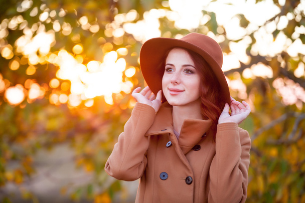 Woman in hat and coat - 写真・画像