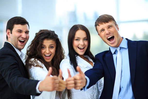 Happy business team with thumbs up in the office - Foto, Imagem