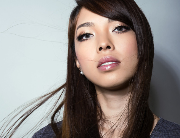 portrait of beautiful young asian woman with clear and flawless skin - Фото, изображение