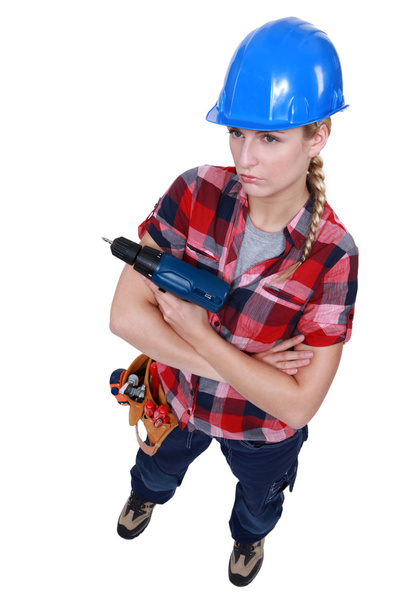 Grumpy female carpenter - Photo, Image