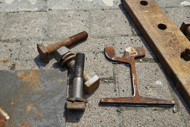 Three big bolts and a key - Foto, Imagem