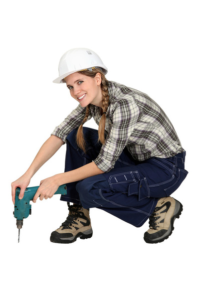Woman holding drill - Foto, Imagem