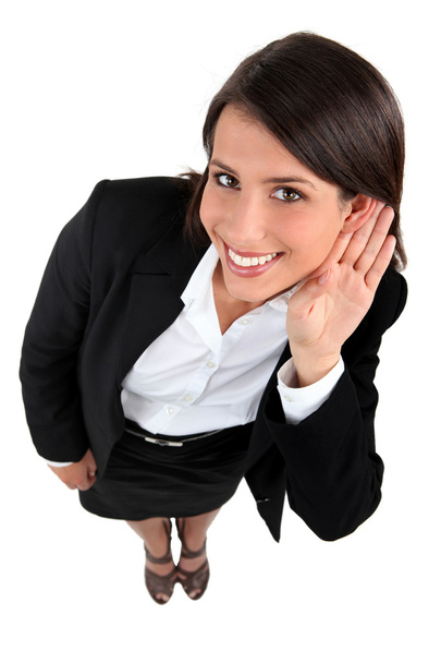 Businesswoman with hand to ear - Foto, immagini