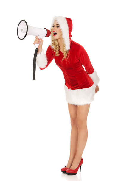 Santa woman screaming by megaphone - Foto, Bild